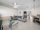 Spacious living room with sectional sofa and dining area at 2907 Willow Oak Ct, Kissimmee, FL 34744
