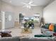 Cozy living room featuring a gray sectional sofa and a coffee table at 2907 Willow Oak Ct, Kissimmee, FL 34744