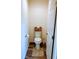 Small bathroom with toilet and storage at 2292 Richey Rd, The Villages, FL 32163