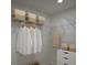 Well-organized walk-in closet with shelving, hanging rods, and storage solutions for optimal space utilization at 3245 Se 142Nd Pl, Summerfield, FL 34491