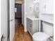 Bathroom with a white vanity, toilet, and tiled tub-shower combo at 948 Lake Destiny Rd # G, Altamonte Springs, FL 32714