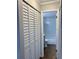 Hallway with closet leading to a bathroom at 948 Lake Destiny Rd # G, Altamonte Springs, FL 32714