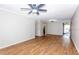 Large open living room with hardwood floors, ceiling fan, and neutral walls at 948 Lake Destiny Rd # G, Altamonte Springs, FL 32714