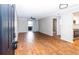 Open-concept living room featuring wood-look flooring and access to outdoor balcony at 948 Lake Destiny Rd # G, Altamonte Springs, FL 32714