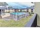 View from the balcony overlooking the community pool and manicured grounds at 948 Lake Destiny Rd # G, Altamonte Springs, FL 32714