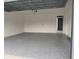 Spacious garage with epoxy flooring and ample storage space at 336 Center Lake Ln # A-2, Oviedo, FL 32765