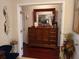 Spacious bedroom with large dresser and hardwood floors at 251 Rock Springs Dr, Poinciana, FL 34759