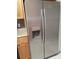 Stainless steel refrigerator with ice and water dispenser at 7520 Marietta St, Orlando, FL 32807