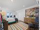 Main bedroom with water views and large dresser at 12943 Se Sunset Harbor Rd, Weirsdale, FL 32195