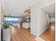 Open entryway with views into the living room and kitchen at 12943 Se Sunset Harbor Rd, Weirsdale, FL 32195