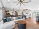 Open floor plan living room with kitchen and dining area visible at 12943 Se Sunset Harbor Rd, Weirsdale, FL 32195
