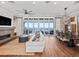 Open living space with water views and dining area at 12943 Se Sunset Harbor Rd, Weirsdale, FL 32195