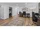 Home office with desk, chair, and plenty of light at 12943 Se Sunset Harbor Rd, Weirsdale, FL 32195