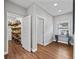 Well-organized pantry with ample shelving for storage at 12943 Se Sunset Harbor Rd, Weirsdale, FL 32195