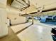An empty two car garage with a view of the street at 510 Coventry Rd, Davenport, FL 33897