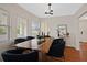 Well-lit dining room featuring a wooden table and seating for six at 2814 Coventry Ave, Lakeland, FL 33803