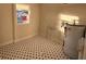 Laundry room with black and white checkered floor at 2814 Coventry Ave, Lakeland, FL 33803