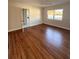 Bright and spacious living room with hardwood floors at 2814 Coventry Ave, Lakeland, FL 33803