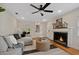 Inviting living room with a fireplace, hardwood floors, and neutral decor at 2814 Coventry Ave, Lakeland, FL 33803