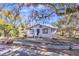 Charming single story home with front yard landscaping at 1316 Hackett St, Mount Dora, FL 32757