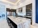Spacious kitchen with stainless steel appliances and marble countertops at 1544 Corolla Ct, Reunion, FL 34747
