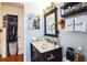 Bathroom with double sink vanity and large mirror at 8115 Esperanza St, Orlando, FL 32817