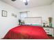 Bright bedroom with a comfortable bed and nightstands at 8115 Esperanza St, Orlando, FL 32817