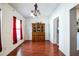 Dining room with hardwood floors and a built-in hutch at 8115 Esperanza St, Orlando, FL 32817