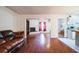 Living room with hardwood floors and a brick fireplace at 8115 Esperanza St, Orlando, FL 32817