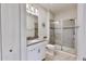 Clean bathroom with a large walk-in shower and modern vanity at 1457 Olympic Club Blvd, Champions Gate, FL 33896