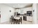 Well-equipped kitchen, featuring white cabinets and stainless steel appliances at 1457 Olympic Club Blvd, Champions Gate, FL 33896