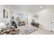 Spacious living room featuring tile floors and ample natural light at 1457 Olympic Club Blvd, Champions Gate, FL 33896