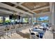 Relaxing pool bar with seating and views of the pool at 1457 Olympic Club Blvd, Champions Gate, FL 33896