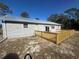 Home with deck and fenced backyard at 11921 Se 169Th Avenue Rd, Ocklawaha, FL 32179