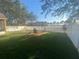Backyard with lake view and fire pit at 124 Dakota Ave, Groveland, FL 34736