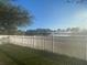 Backyard with lake view and fire pit at 124 Dakota Ave, Groveland, FL 34736