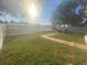 Backyard with walkway and fire pit at 124 Dakota Ave, Groveland, FL 34736