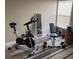 Home gym with exercise bike, weight bench, and free weights at 124 Dakota Ave, Groveland, FL 34736