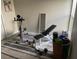 Home gym with exercise bike, weight bench, and free weights at 124 Dakota Ave, Groveland, FL 34736