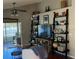 Living room features hardwood floors, built-in shelving, and lake view at 124 Dakota Ave, Groveland, FL 34736