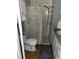 Well-lit bathroom featuring a shower, toilet, and vanity with storage, designed for functionality and comfort at 2488 Hartridge Point W Dr # 2488, Winter Haven, FL 33881