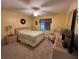 Cozy carpeted bedroom with ceiling fan at 2488 Hartridge Point W Dr # 2488, Winter Haven, FL 33881