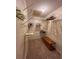 Walk in closet with custom shelving provides organized storage space at 2488 Hartridge Point W Dr # 2488, Winter Haven, FL 33881