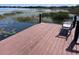 Serene dockside seating with tranquil lake views at 2488 Hartridge Point W Dr # 2488, Winter Haven, FL 33881