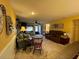 Spacious living room with a stone fireplace and comfortable seating at 2488 Hartridge Point W Dr # 2488, Winter Haven, FL 33881
