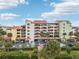 Three-story building with Spanish-style architecture and parking at 612 Marina Point Dr # 6120, Daytona Beach, FL 32114