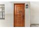 Condo's front door, made of wood with a black door handle at 612 Marina Point Dr # 6120, Daytona Beach, FL 32114