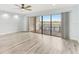 Living room with water views and sliding glass doors to balcony at 612 Marina Point Dr # 6120, Daytona Beach, FL 32114