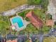 Community pool with lounge chairs and landscaping at 612 Marina Point Dr # 6120, Daytona Beach, FL 32114