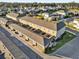 Aerial view of townhouses with garages and community at 688 Orange Belt Loop, Winter Garden, FL 34787